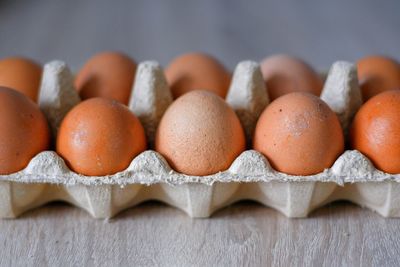 Close-up of eggs in row