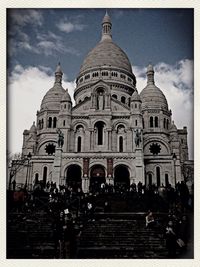 Tourists in front of historical building
