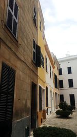 Low angle view of buildings against sky