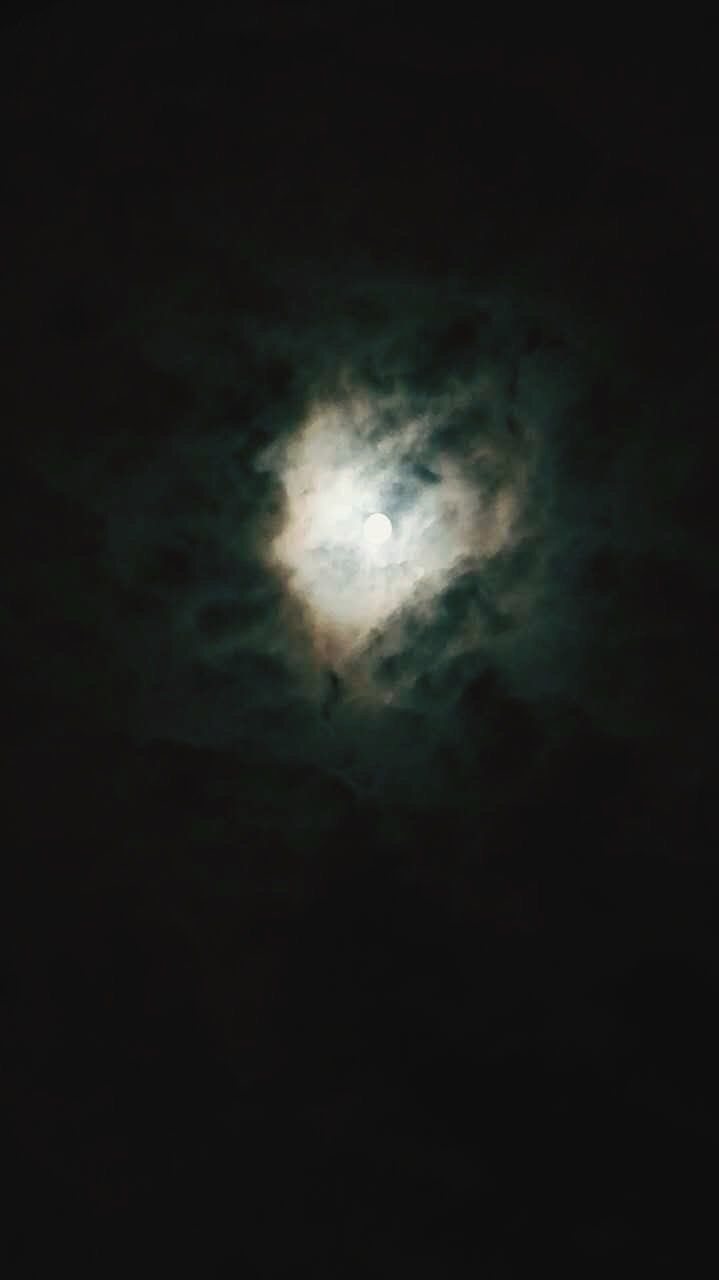 night, low angle view, sky, moon, dark, beauty in nature, scenics, tranquility, tranquil scene, nature, astronomy, sky only, copy space, majestic, moonlight, idyllic, cloud - sky, silhouette, glowing, full moon