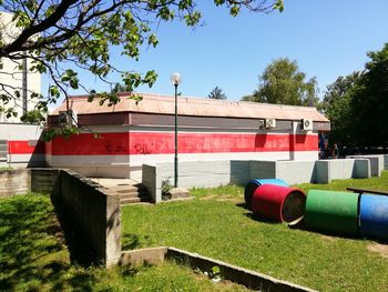 Built structure on field against sky