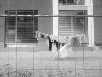 Drying rack behind fence