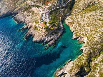 Aerial view of rock formation in sea