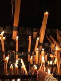 Illuminated candles in temple
