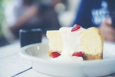 Close-up of cake served on table