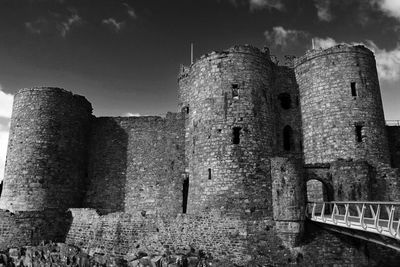 Low angle view of old ruin against sky