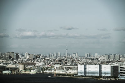 Buildings in city against sky