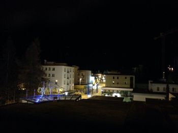 Illuminated buildings at night