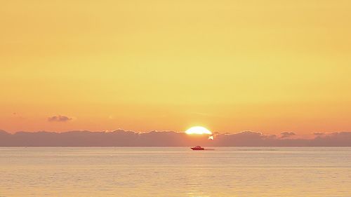 Scenic view of sea during sunset