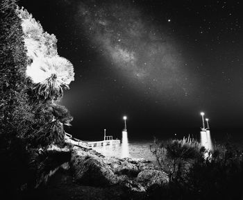 Scenic view of sea against sky at night