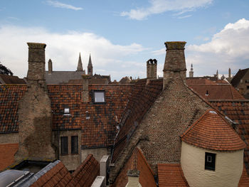 Buildings in city against sky