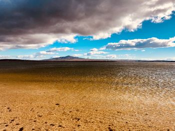 Scenic view of desert against sky