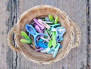 High angle view of candies in basket on table