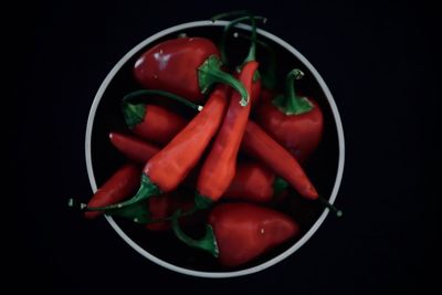 Directly above shot of chili peppers in container