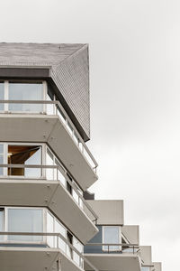 Low angle view of buildings against clear sky