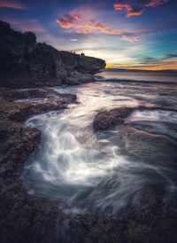 Scenic view of sea against sky during sunset