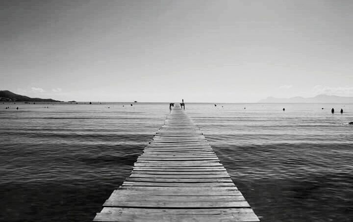 VIEW OF PIER IN SEA