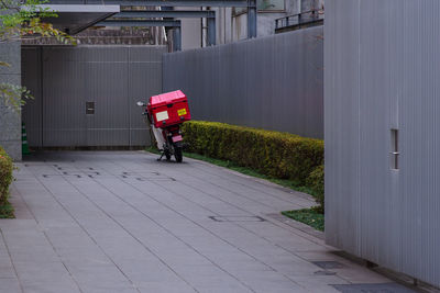 Rear view of woman walking on street