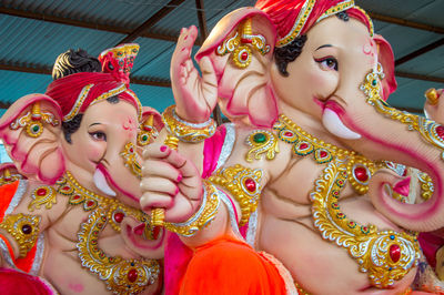 Close-up of ganesha idols