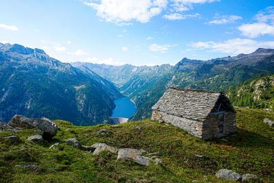 Perfect view from the corte di mezzo alp to the lago del sambuco dam with dramatic landscape