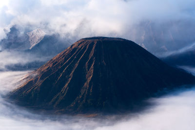 Panoramic view of volcanic mountain against sky