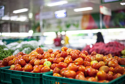 Close-up of fresh tomatoes for sale at hyper market stall