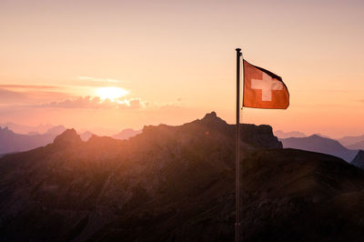 Scenic view of mountains against sky during sunset