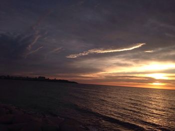 Scenic view of sea at sunset