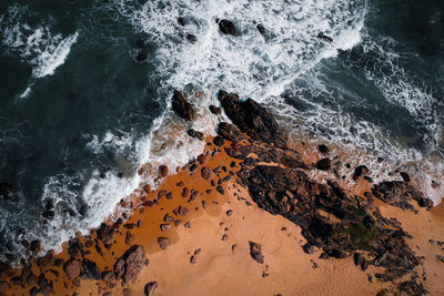 High angle view of rocks on beach