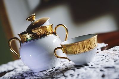 Close-up of coffee cup on table