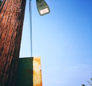 Low angle view of built structure against clear blue sky