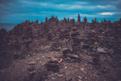 Stacks of rocks against sky