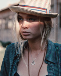 Portrait of woman wearing hat