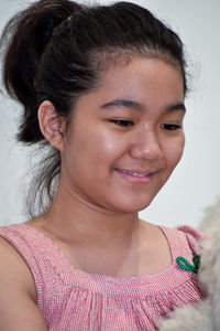 Close-up portrait of a smiling girl