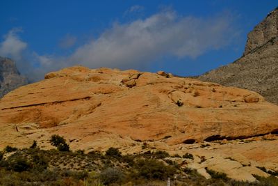 Low angle view of rock against sky