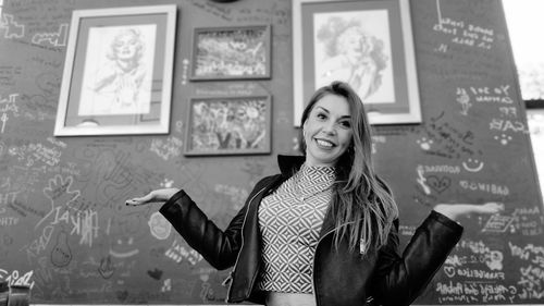 Portrait of young woman using mobile phone