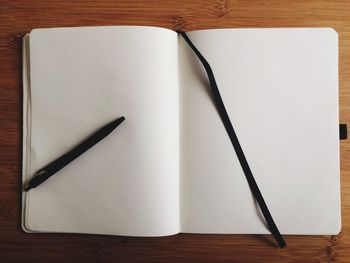 Close-up of pen on paper