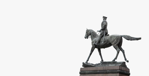 Low angle view of statue against clear sky