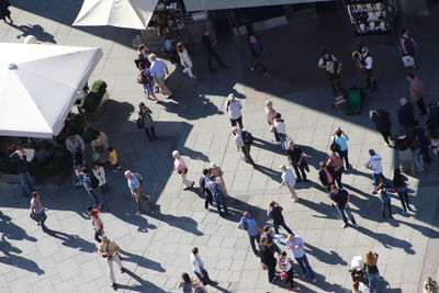 High angle view of people walking on street