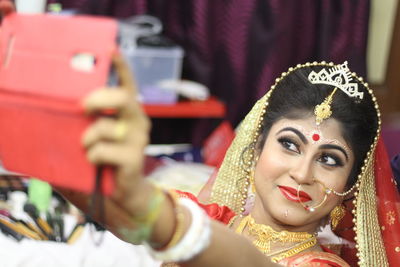 Close-up of young woman taking selfie