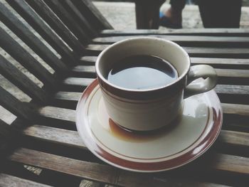 High angle view of coffee cup on table