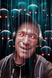 Portrait of young woman seen through glass at night