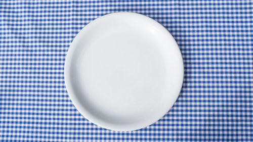 High angle view of empty plate on table