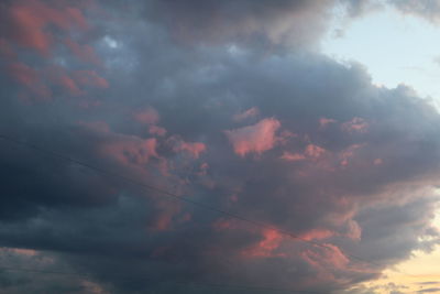 Low angle view of dramatic sky during sunset