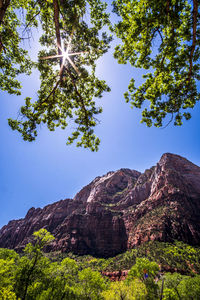 Low angle view of rocks against sky