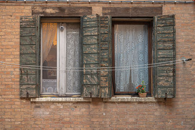 Closed window of old building