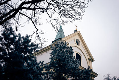 Low angle view of church against sky