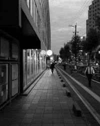 People walking on city street