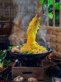 Close-up of food on table at temple