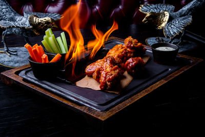 High angle view of meat on barbecue grill